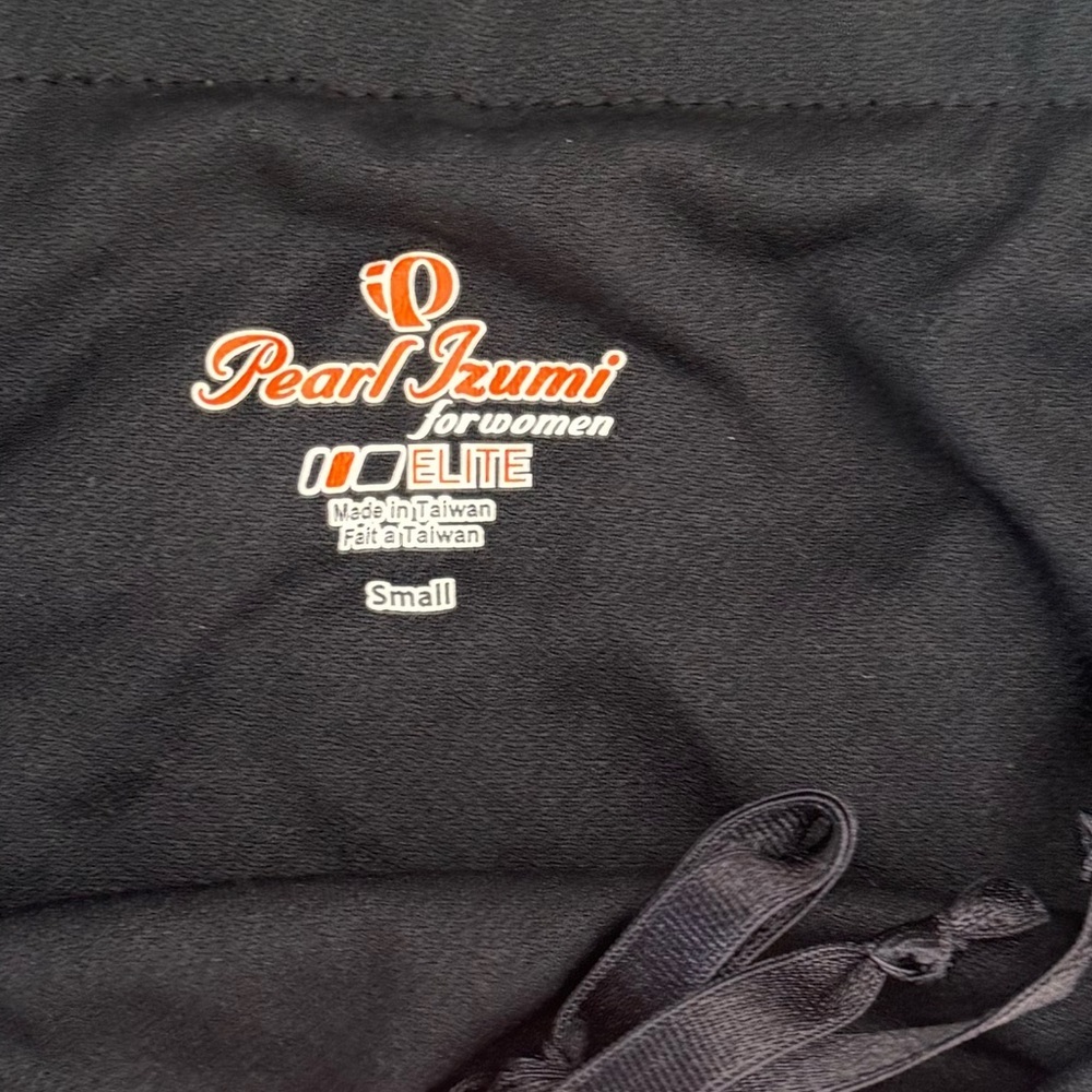 Pearl Izumi Women's Athletic Shorts in Black and Purple - Picture 2 of 4